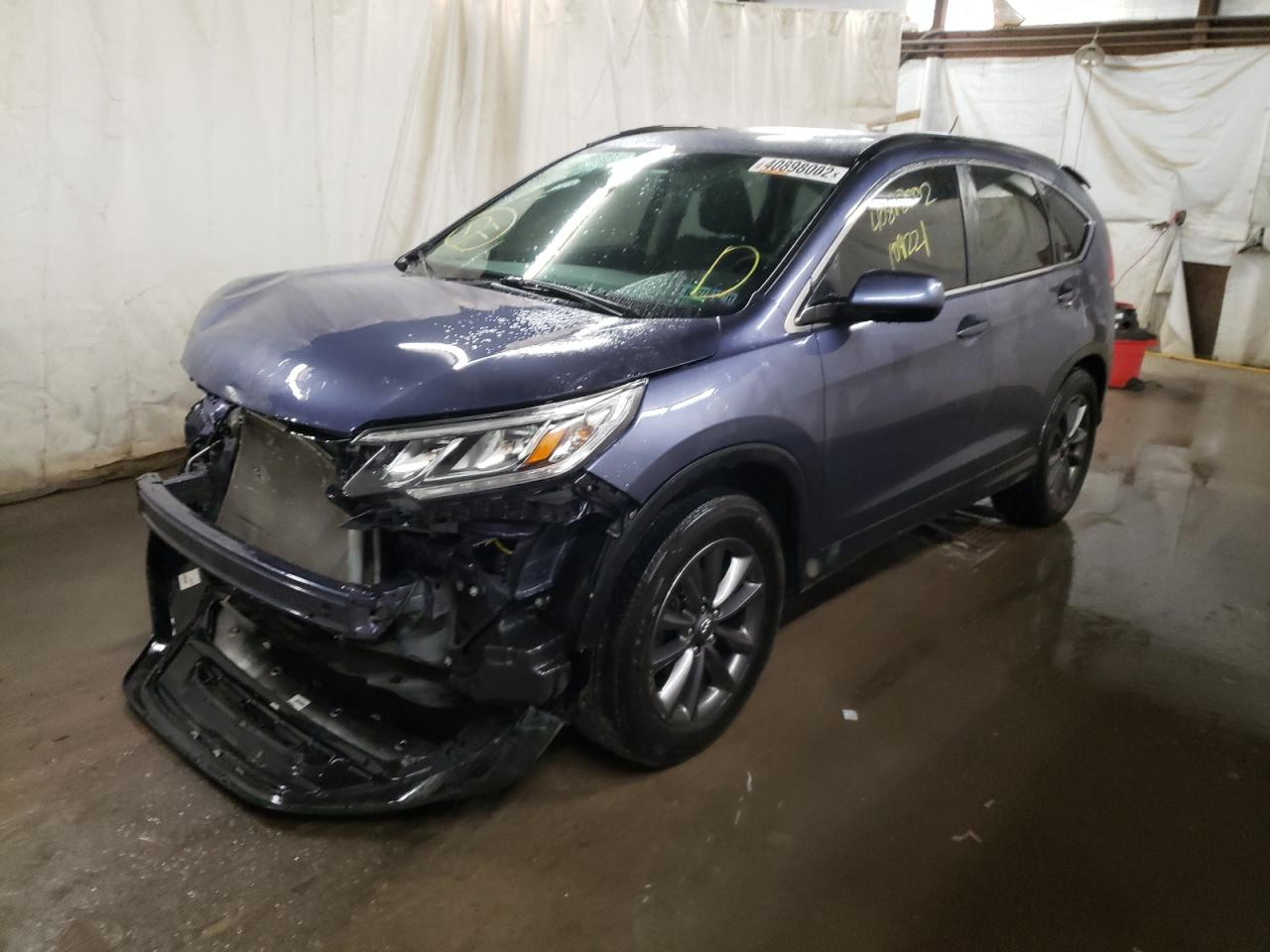 Photo 2 from auction – 2012 HONDA CR-V EX with VIN JHLRM4H57CC004281