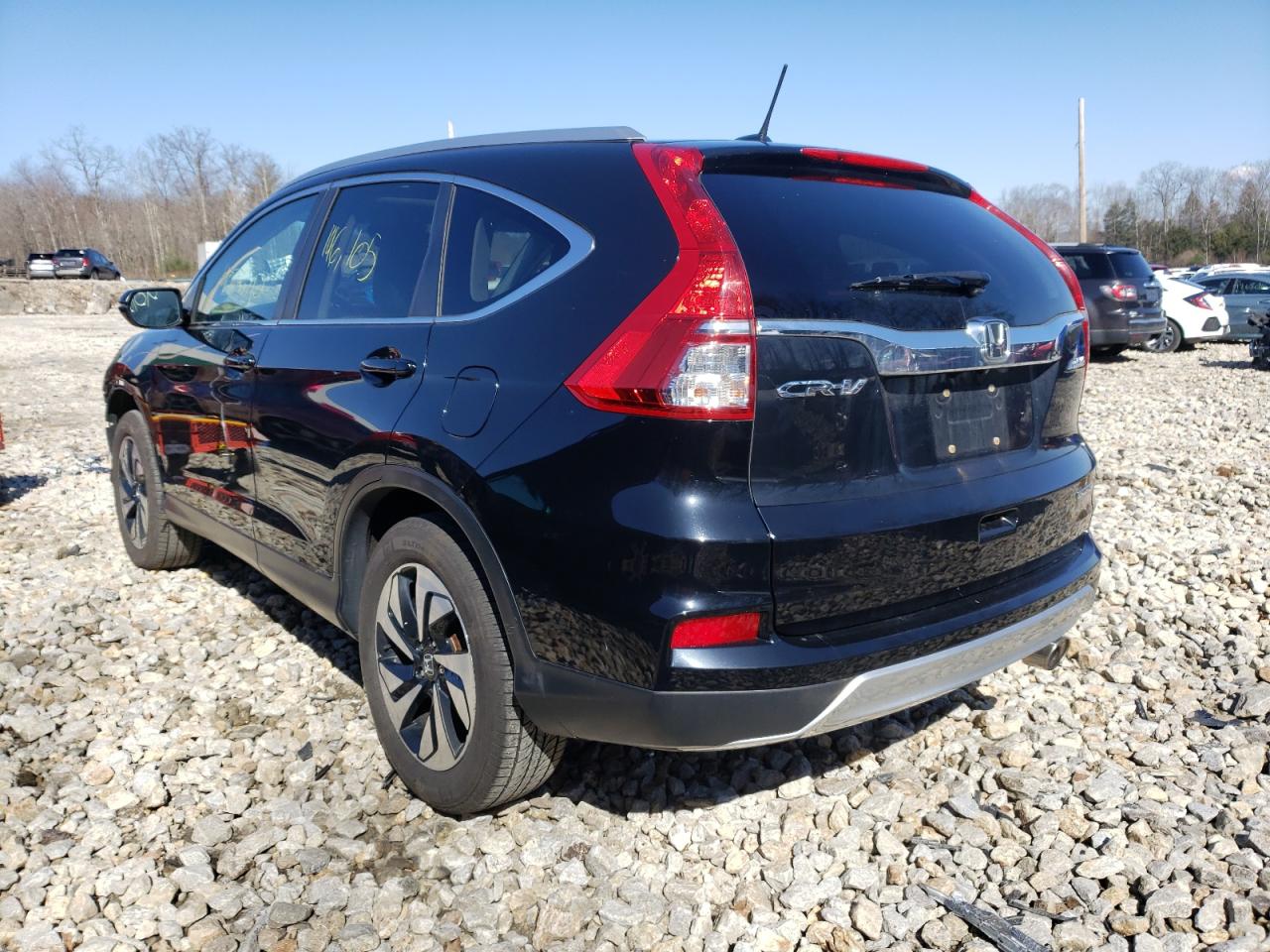 Photo 3 from auction – 2015 HONDA CR-V TOURI with VIN 5J6RM4H97FL063359