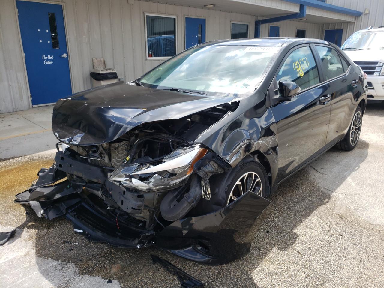 Photo 2 from auction – 2016 TOYOTA COROLLA L with VIN 5YFBURHE0GP502069