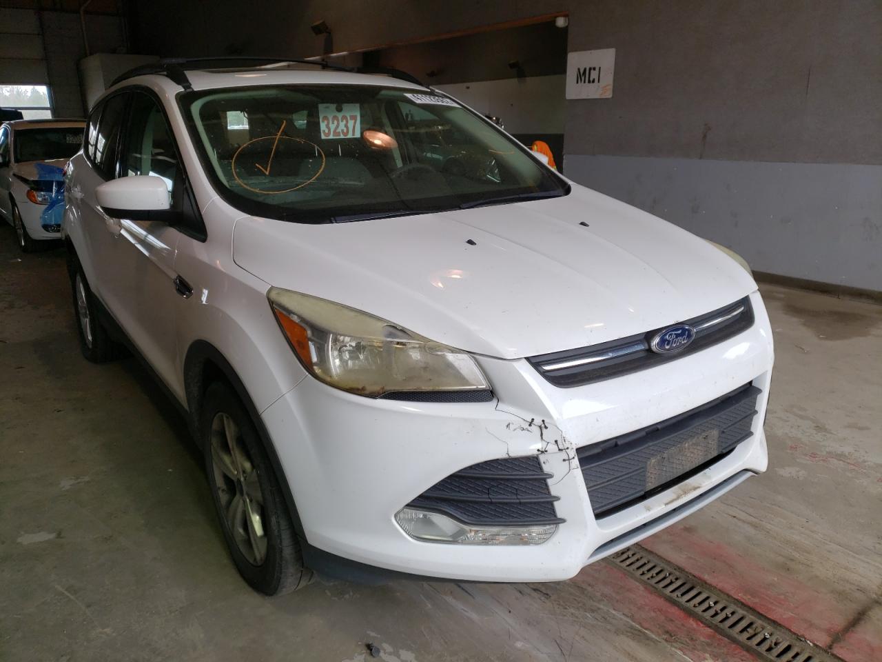 FORD ESCAPE SE 2013 with VIN 1FMCU0GX6DUC22301 - Photo from auction