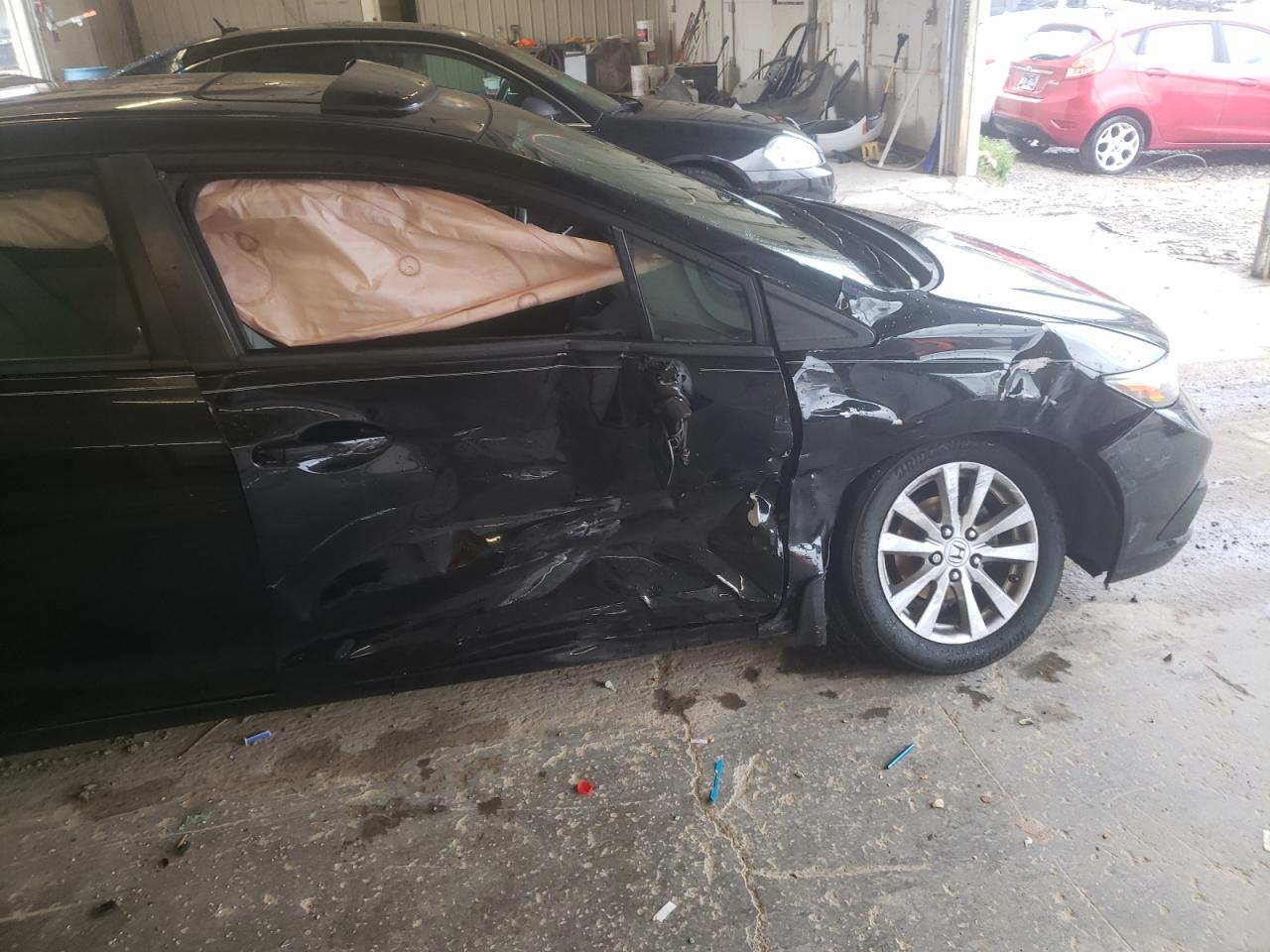 Photo 9 from auction – 2012 HONDA CIVIC EXL with VIN 2HGFB2F97CH545068