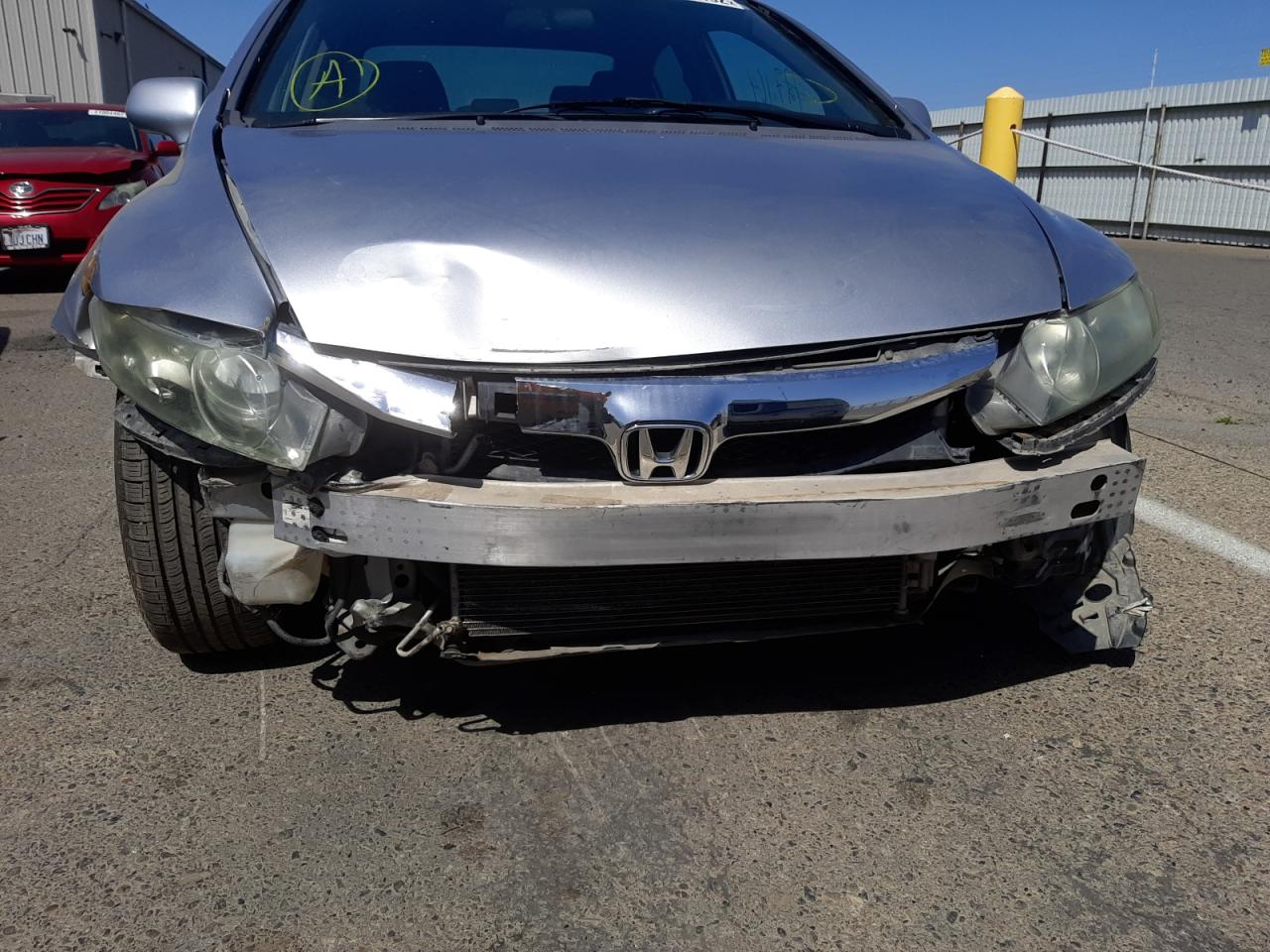 Photo 9 from auction – 2010 HONDA CIVIC LX-S with VIN 19XFA1F64AE008569