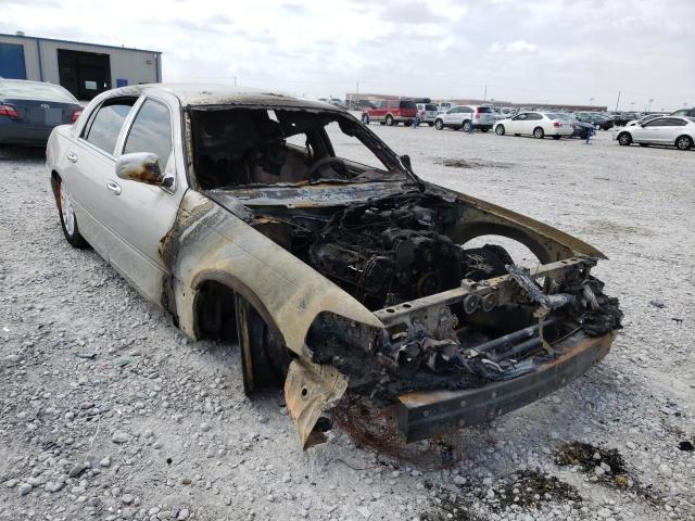 LINCOLN TOWN CAR E 2004 with VIN 1LNHM81W04Y623744 - Photo from auction