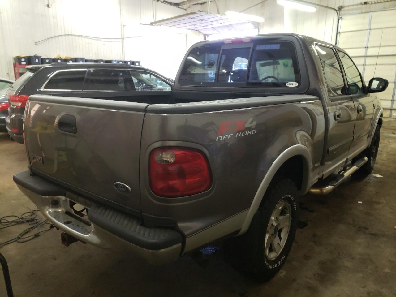 Photo 4 from auction – 2003 FORD F150 SUPER with VIN 1FTRW08L63KD27905