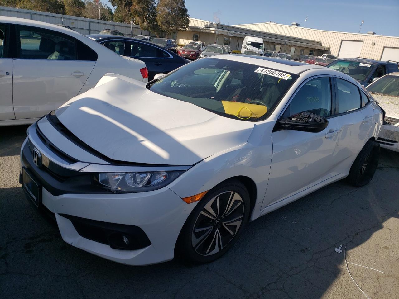 Photo 2 from auction – 2017 HONDA CIVIC EX with VIN 19XFC1F40HE212854