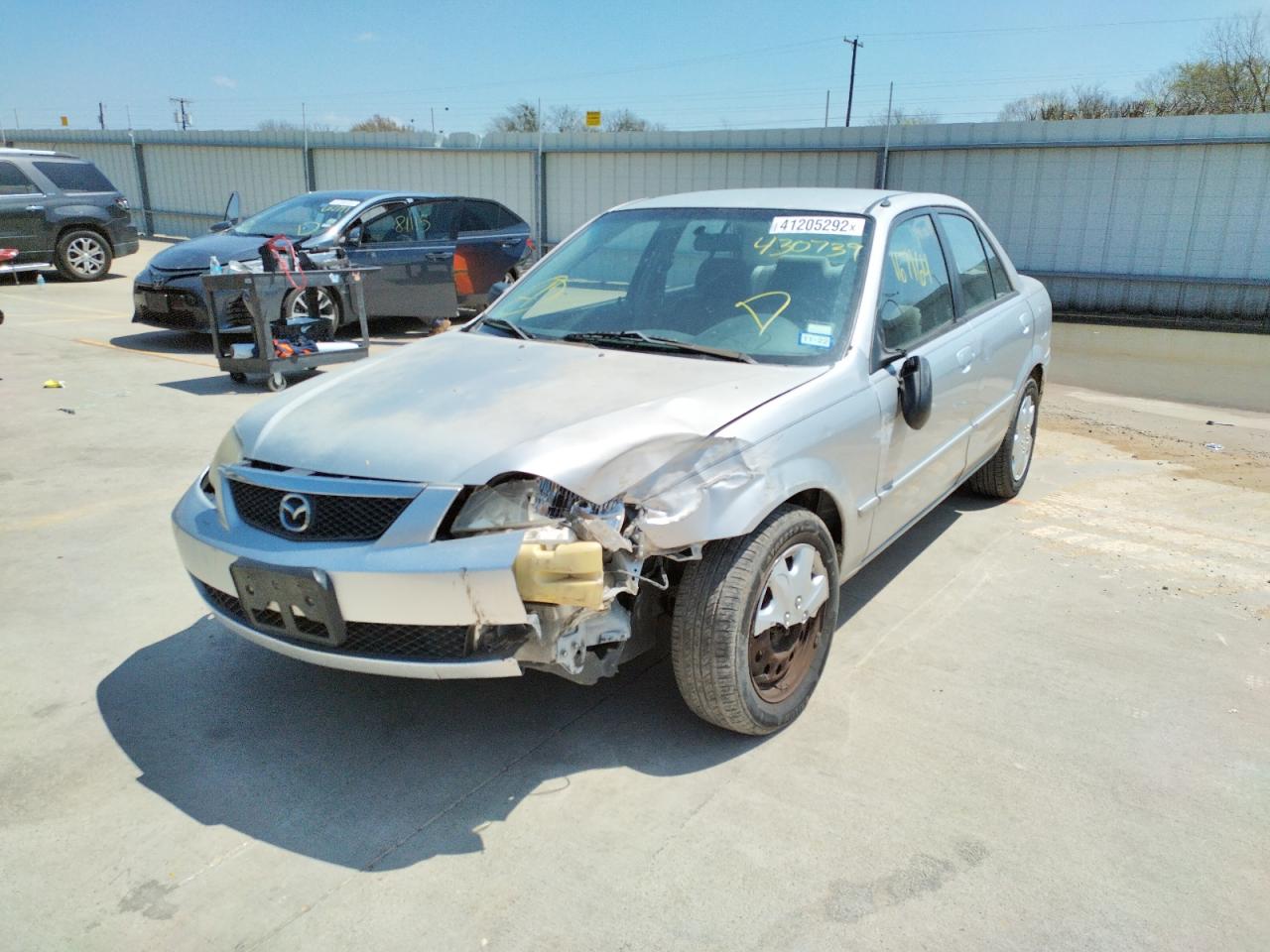 Photo 9 from auction – 2001 MAZDA PROTEGE LX with VIN JM1BJ225610430739
