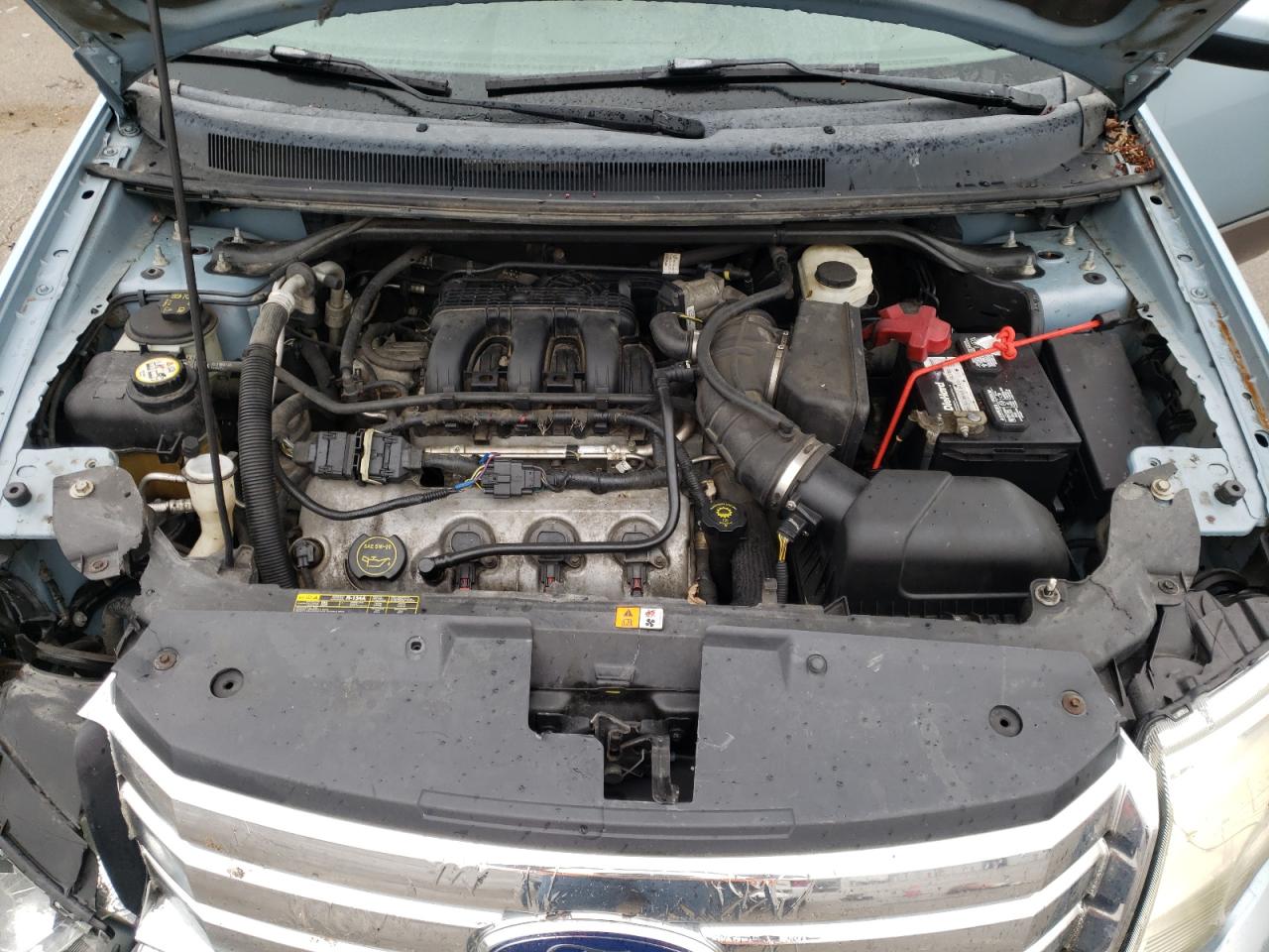 Photo 7 from auction – 2008 FORD TAURUS X S with VIN 1FMDK05W68GA01399