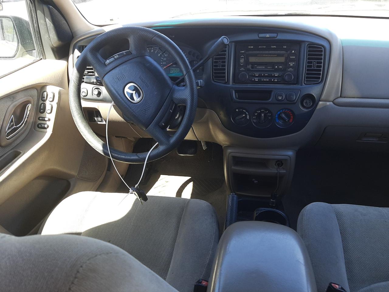 Photo 9 from auction – 2002 MAZDA TRIBUTE LX with VIN 4F2YU09132KM19762