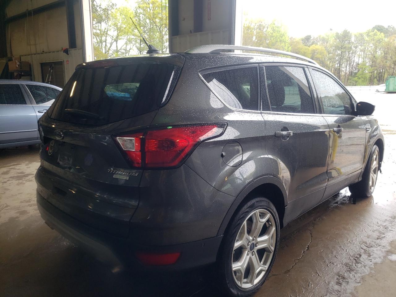 Photo 4 from auction – 2019 FORD ESCAPE TIT with VIN 1FMCU0J92KUA10552