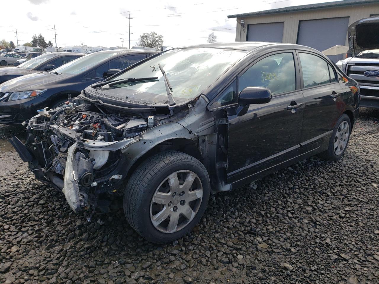 Photo 2 from auction – 2011 HONDA CIVIC LX with VIN 2HGFA1F5XBH303688