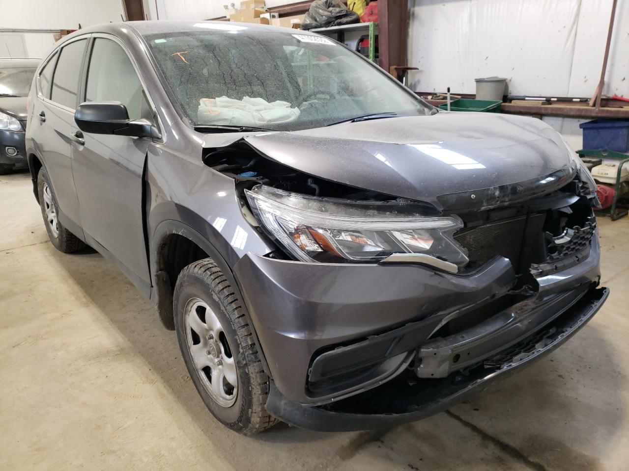 HONDA CR-V LX 2015 with VIN 2HKRM4H33FH116449 - Photo from auction