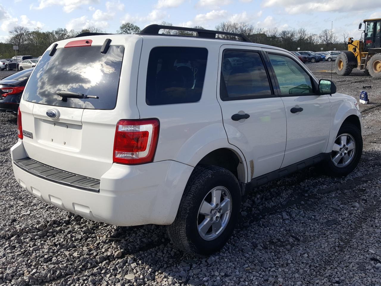 Photo 4 from auction – 2009 FORD ESCAPE XLT with VIN 1FMCU03G79KA65919