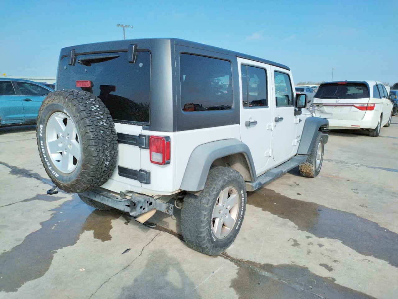 Photo 4 from auction – 2014 JEEP WRANGLER U with VIN 1C4BJWDG5EL245222