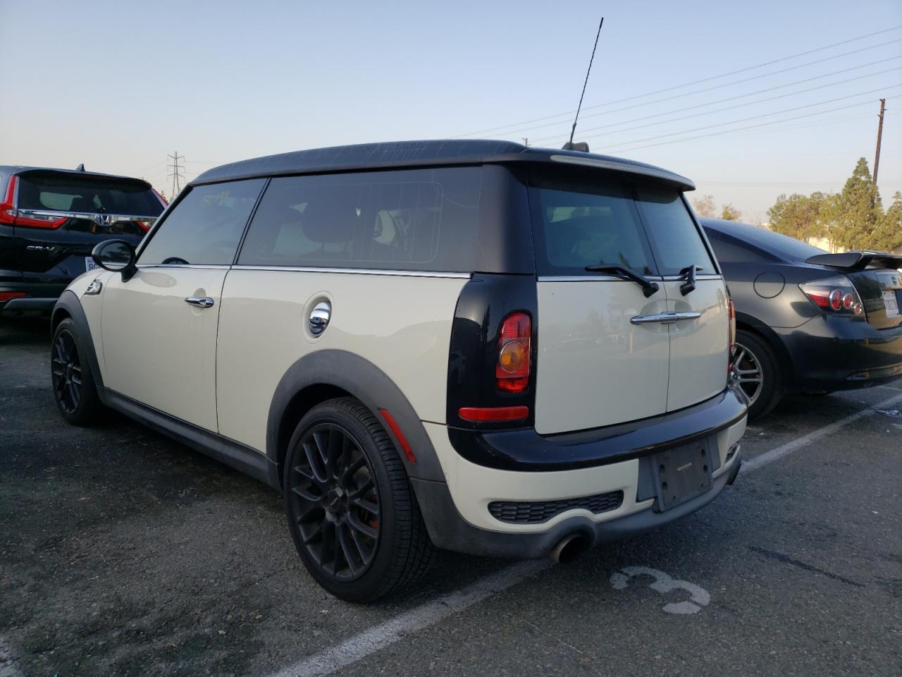 Photo 3 from auction – 2009 MINI COOPER CLU with VIN WMWMM93519TL04075