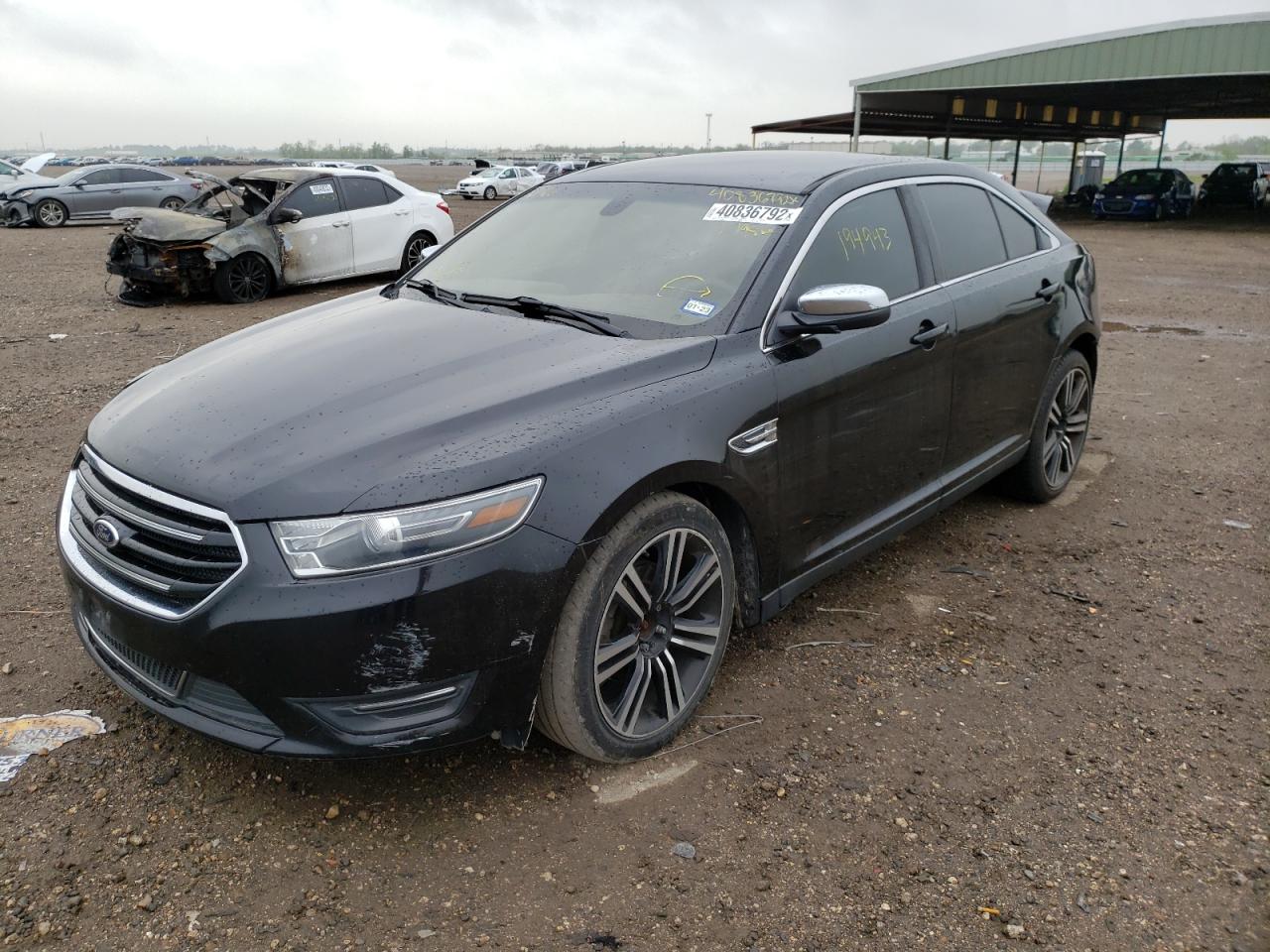 Photo 2 from auction – 2014 FORD TAURUS LIM with VIN 1FAHP2F81EG179886