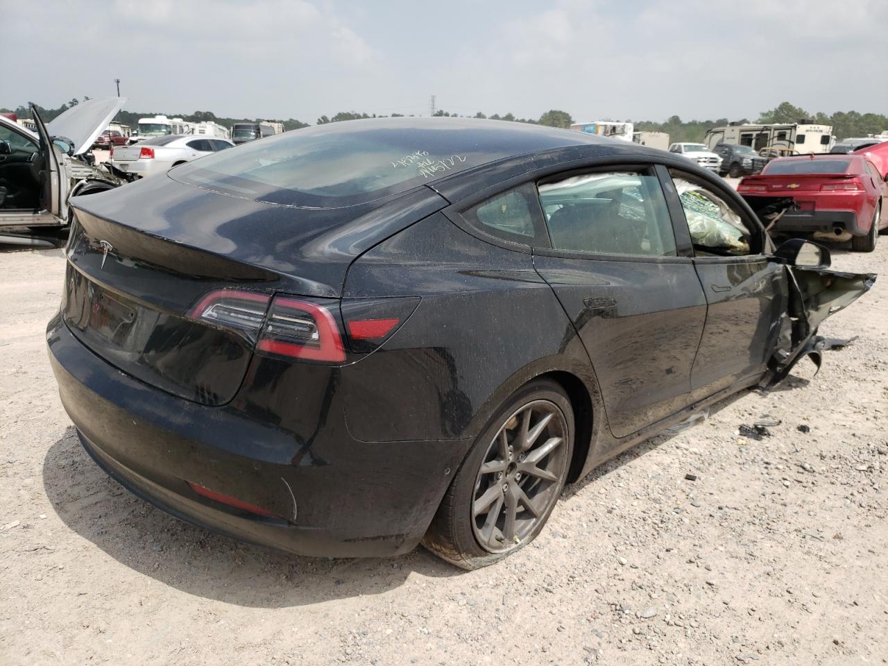 Photo 4 from auction – 2021 TESLA MODEL 3 with VIN 5YJ3E1EA1MF093379