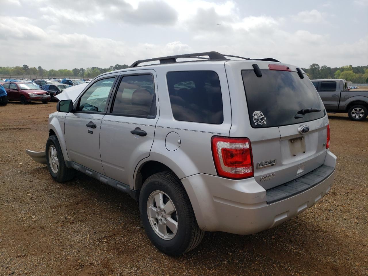 Photo 3 from auction – 2011 FORD ESCAPE HEV with VIN 1FMCU0DG6BKC04250