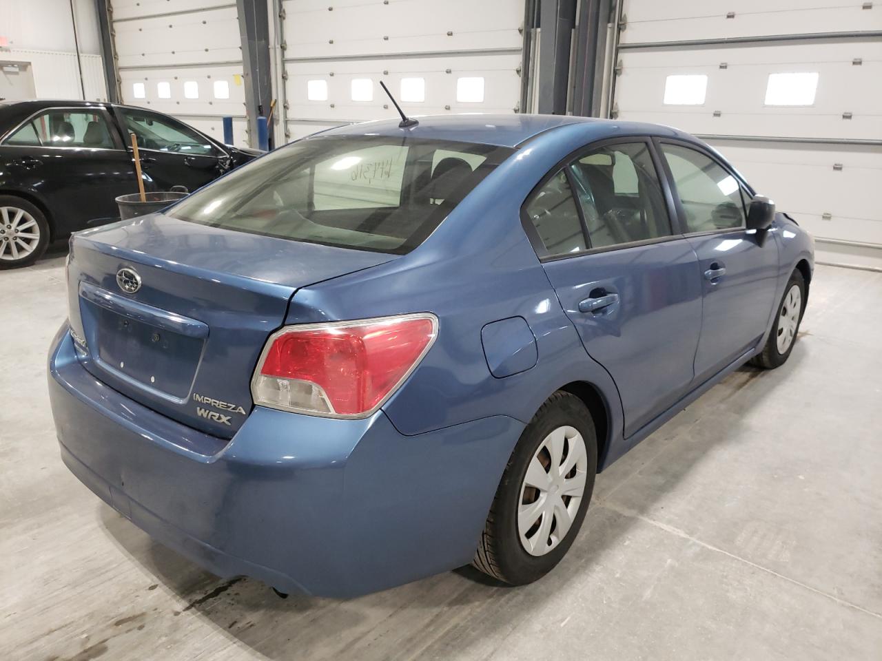 Photo 4 from auction – 2014 SUBARU IMPREZA with VIN JF1GJAA65EH025768
