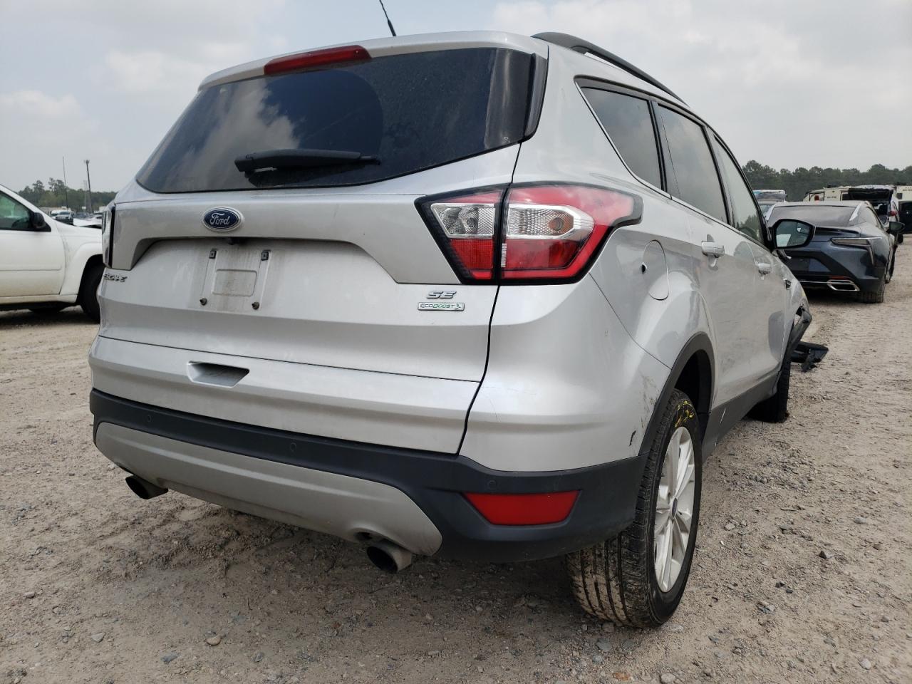 Photo 4 from auction – 2018 FORD ESCAPE SE with VIN 1FMCU0GD4JUD38243