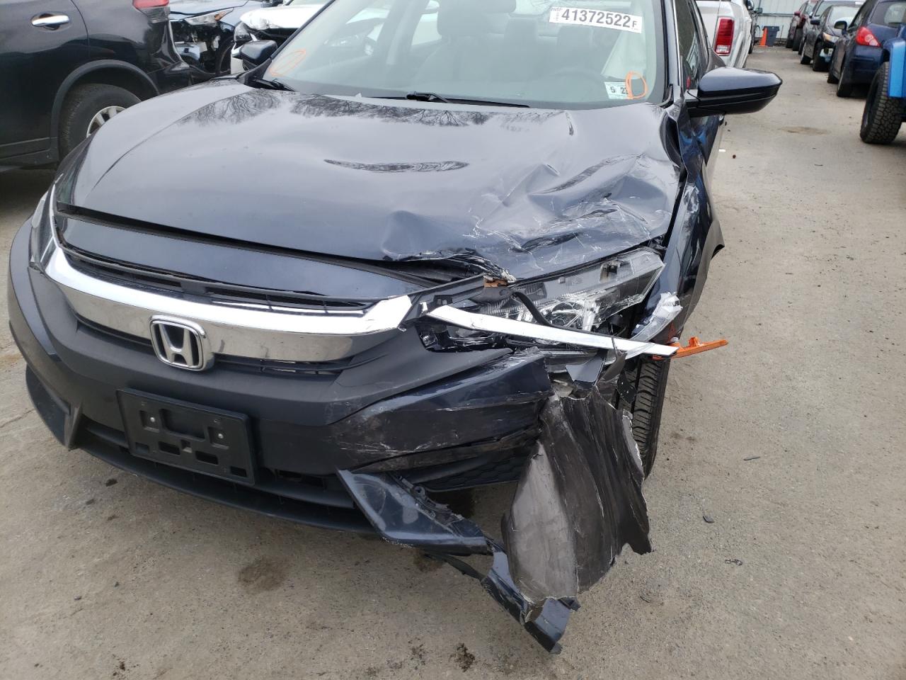 Photo 9 from auction – 2018 HONDA CIVIC LX with VIN 2HGFC2F59JH534855
