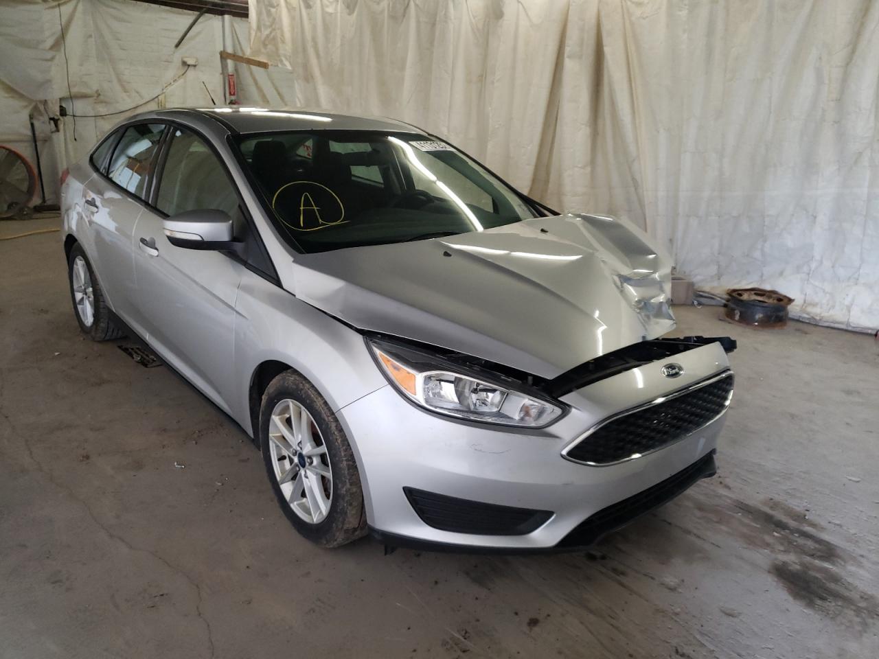 FORD FOCUS SE 2015 with VIN 1FADP3F27FL217419 - Photo from auction