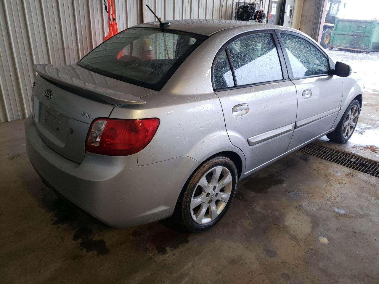 Photo 4 from auction – 2011 KIA RIO BASE with VIN KNADH4A38B6949383