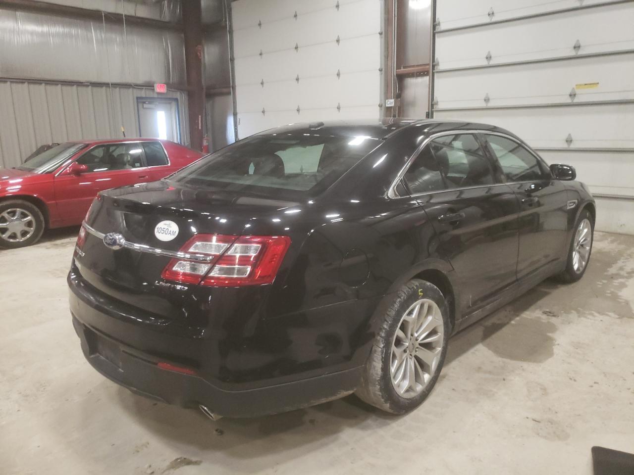 Photo 4 from auction – 2013 FORD TAURUS LIM with VIN 1FAHP2F84DG193022