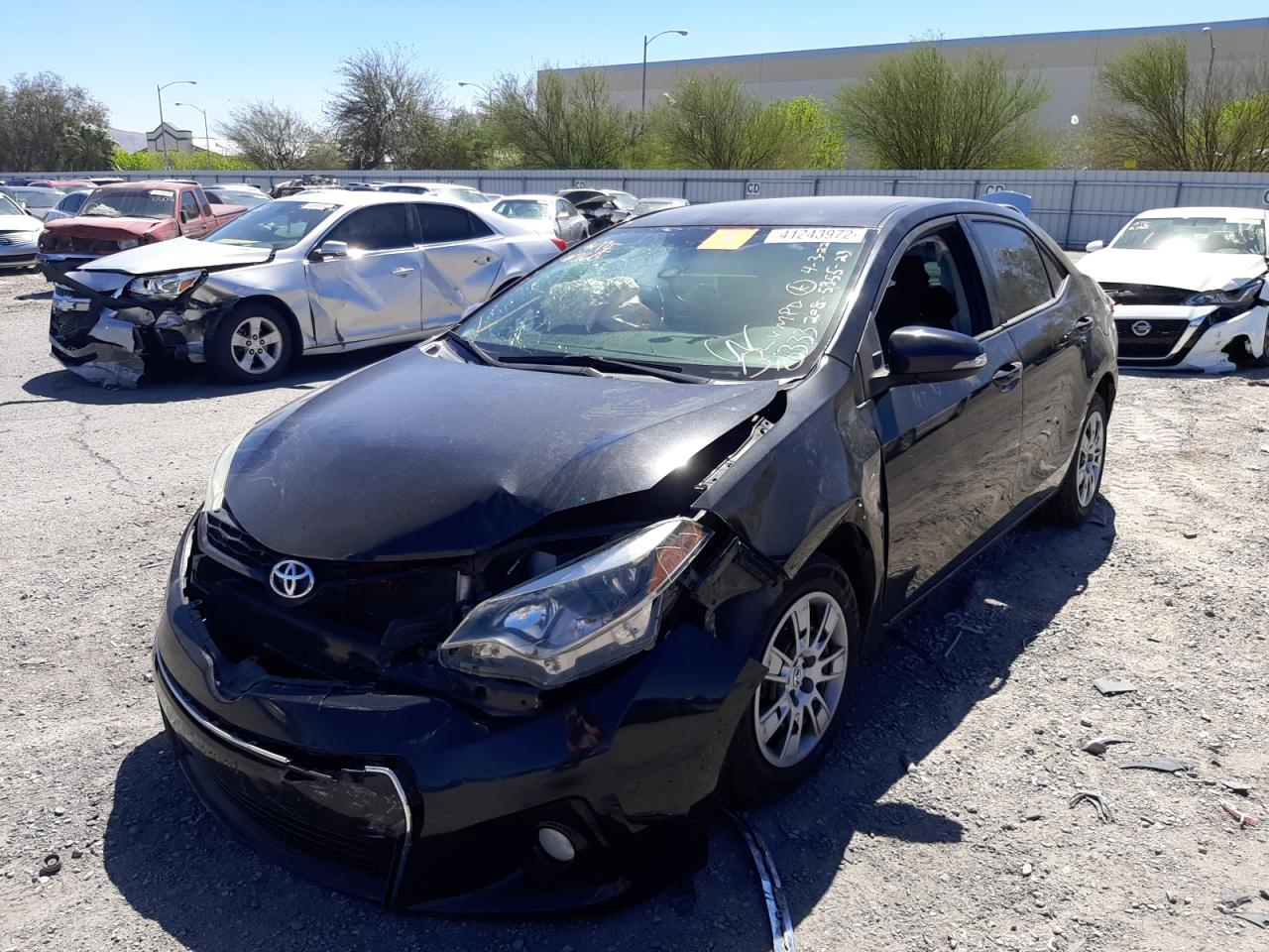 Photo 2 from auction – 2015 TOYOTA COROLLA L with VIN 5YFBURHE2FP280231