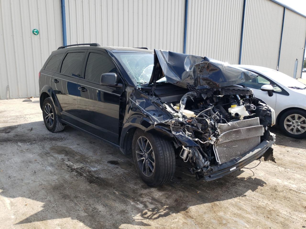DODGE JOURNEY SE 2018 with VIN 3C4PDCAB2JT310501 - Photo from auction