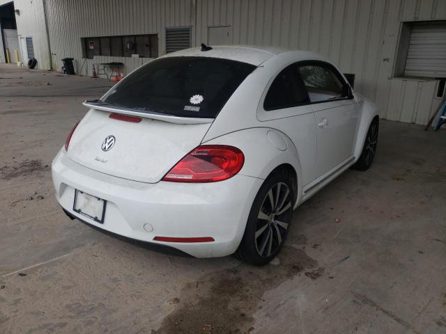 Photo 4 from auction – 2016 VOLKSWAGEN BEETLE SE with VIN 3VWJ07AT2GM616406