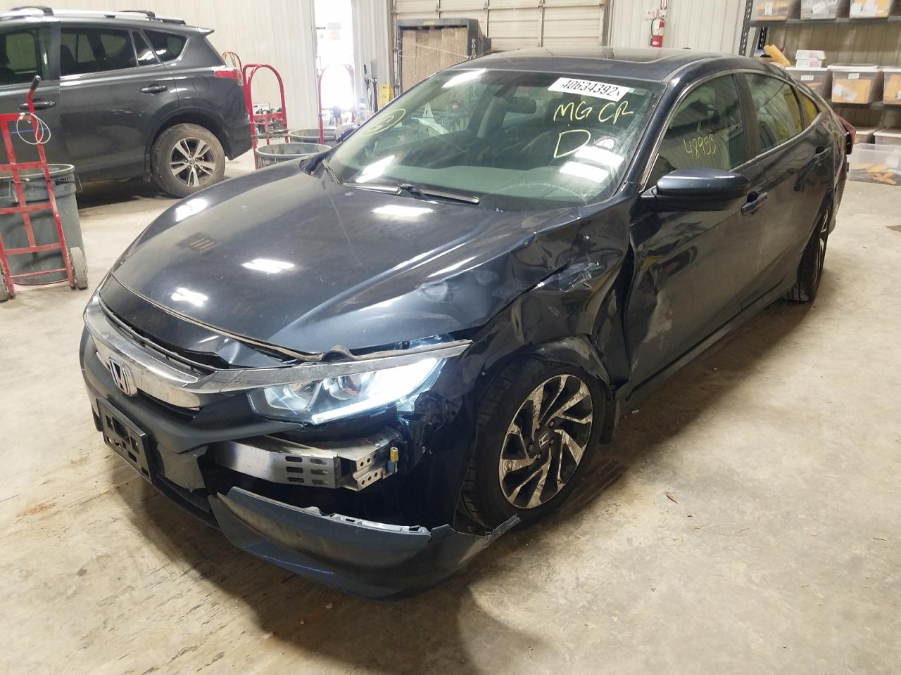 Photo 2 from auction – 2018 HONDA CIVIC EX with VIN 2HGFC2F74JH555274