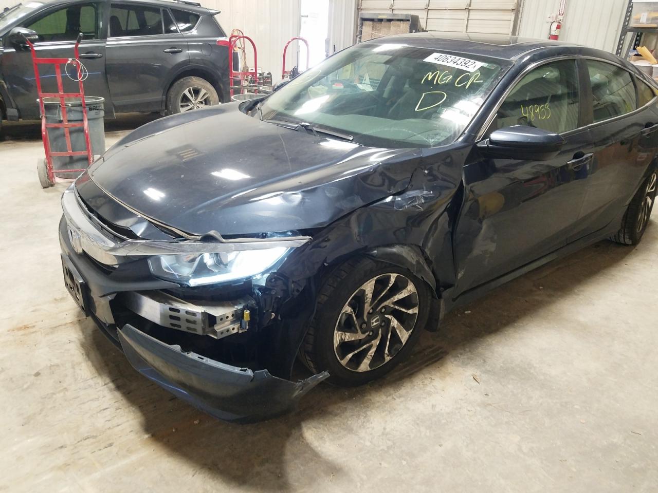 Photo 9 from auction – 2018 HONDA CIVIC EX with VIN 2HGFC2F74JH555274