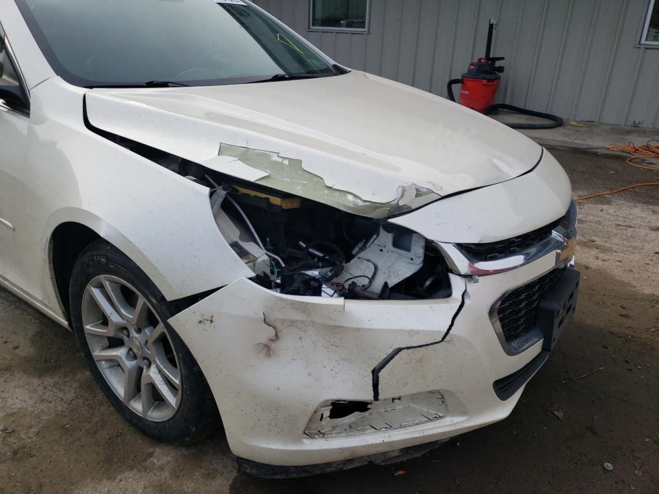 Photo 9 from auction – 2014 CHEVROLET MALIBU 1LT with VIN 1G11C5SL2EF183060