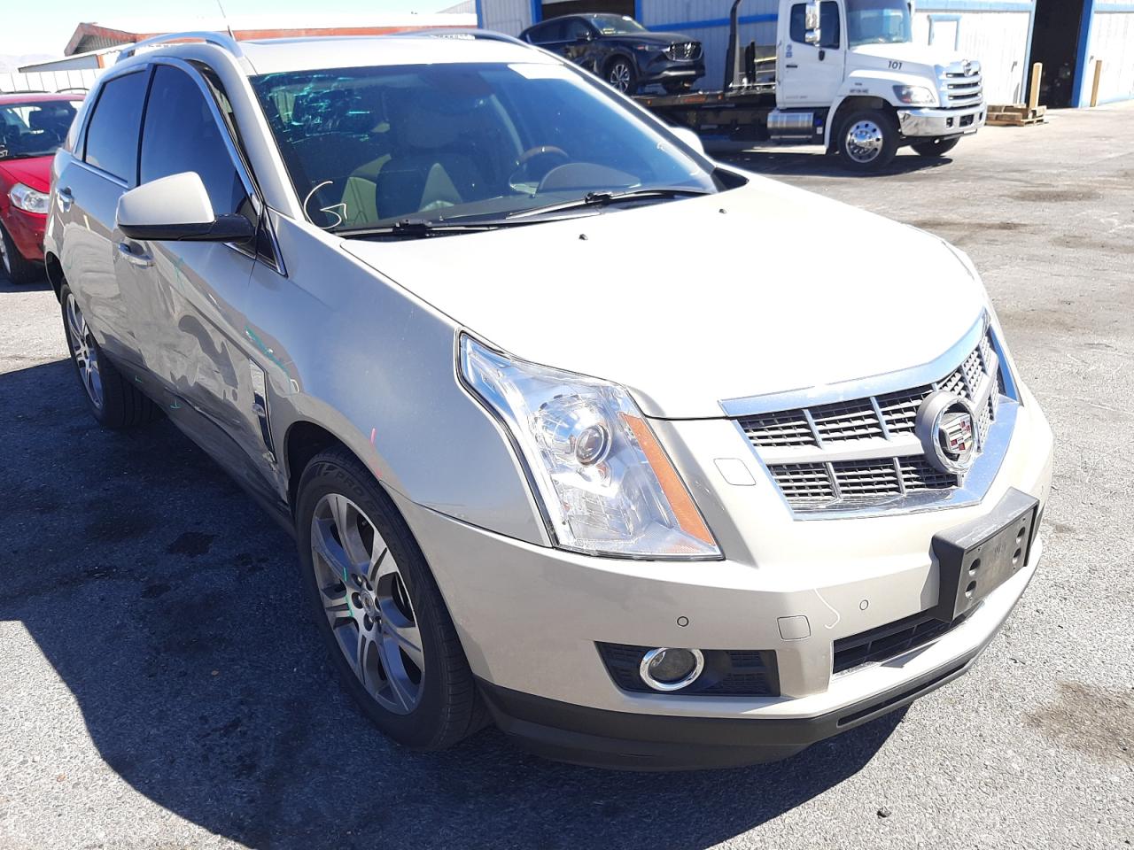 CADILLAC SRX PERFOR 2012 with VIN 3GYFNBE30CS544628 - Photo from auction