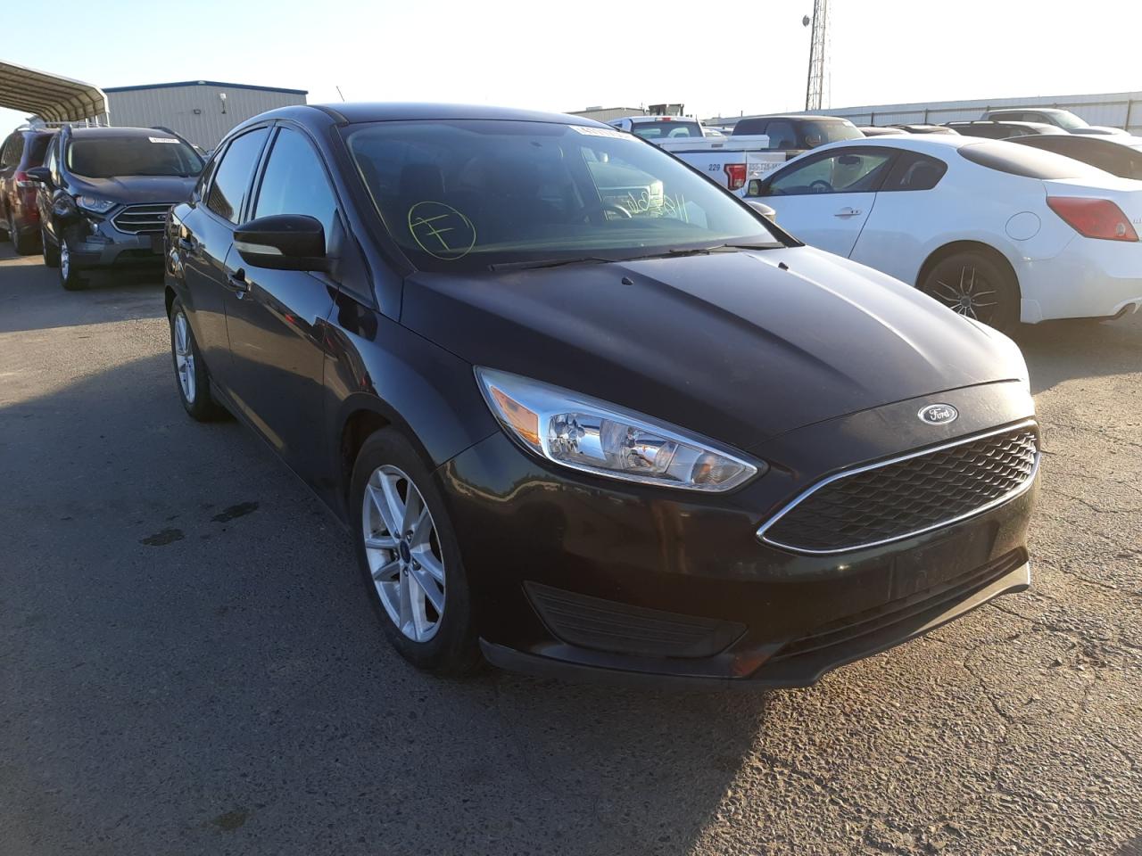 FORD FOCUS SE 2016 with VIN 1FADP3F26GL337729 - Photo from auction