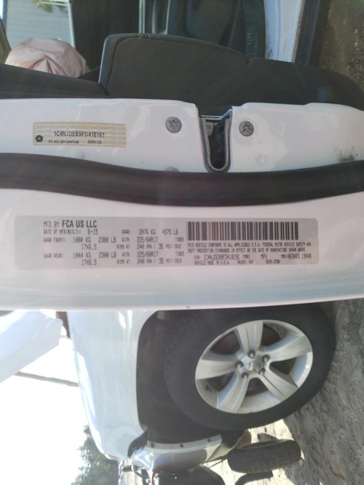 Photo 10 from auction – 2015 JEEP COMPASS LA with VIN 1C4NJDEB9FD418191