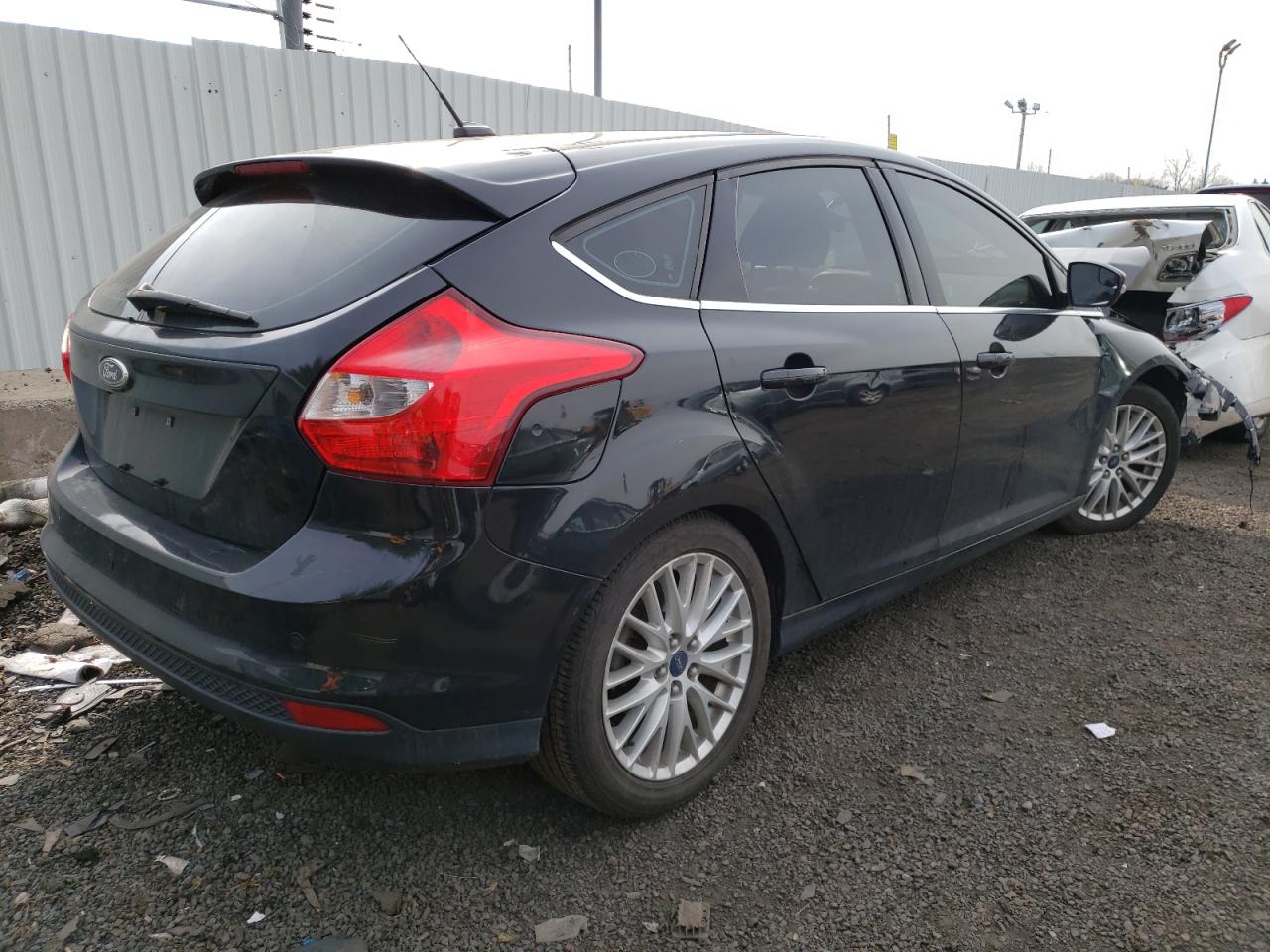 Photo 4 from auction – 2014 FORD FOCUS TITA with VIN 1FADP3N23EL409128