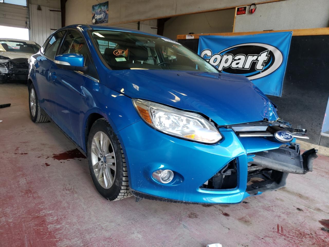 FORD FOCUS SEL 2012 with VIN 1FAHP3H27CL397334 - Photo from auction