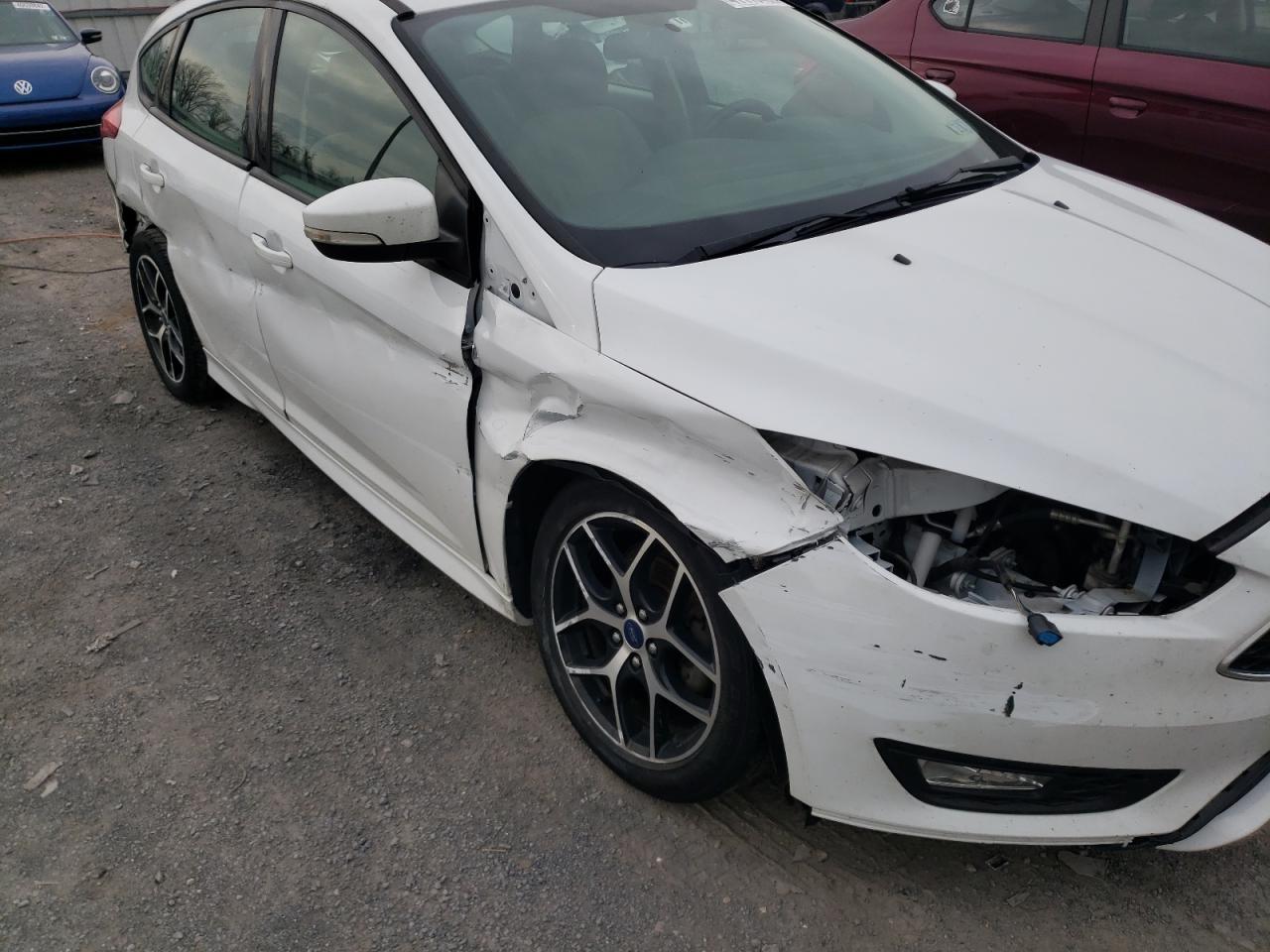 Photo 9 from auction – 2016 FORD FOCUS SE with VIN 1FADP3K21GL376024