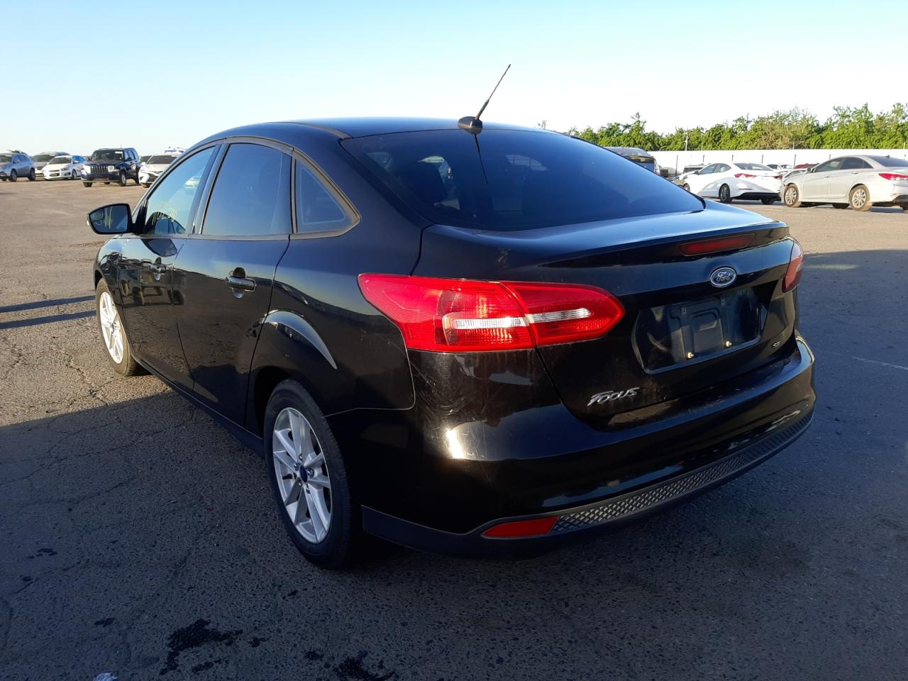 Photo 3 from auction – 2016 FORD FOCUS SE with VIN 1FADP3F26GL337729