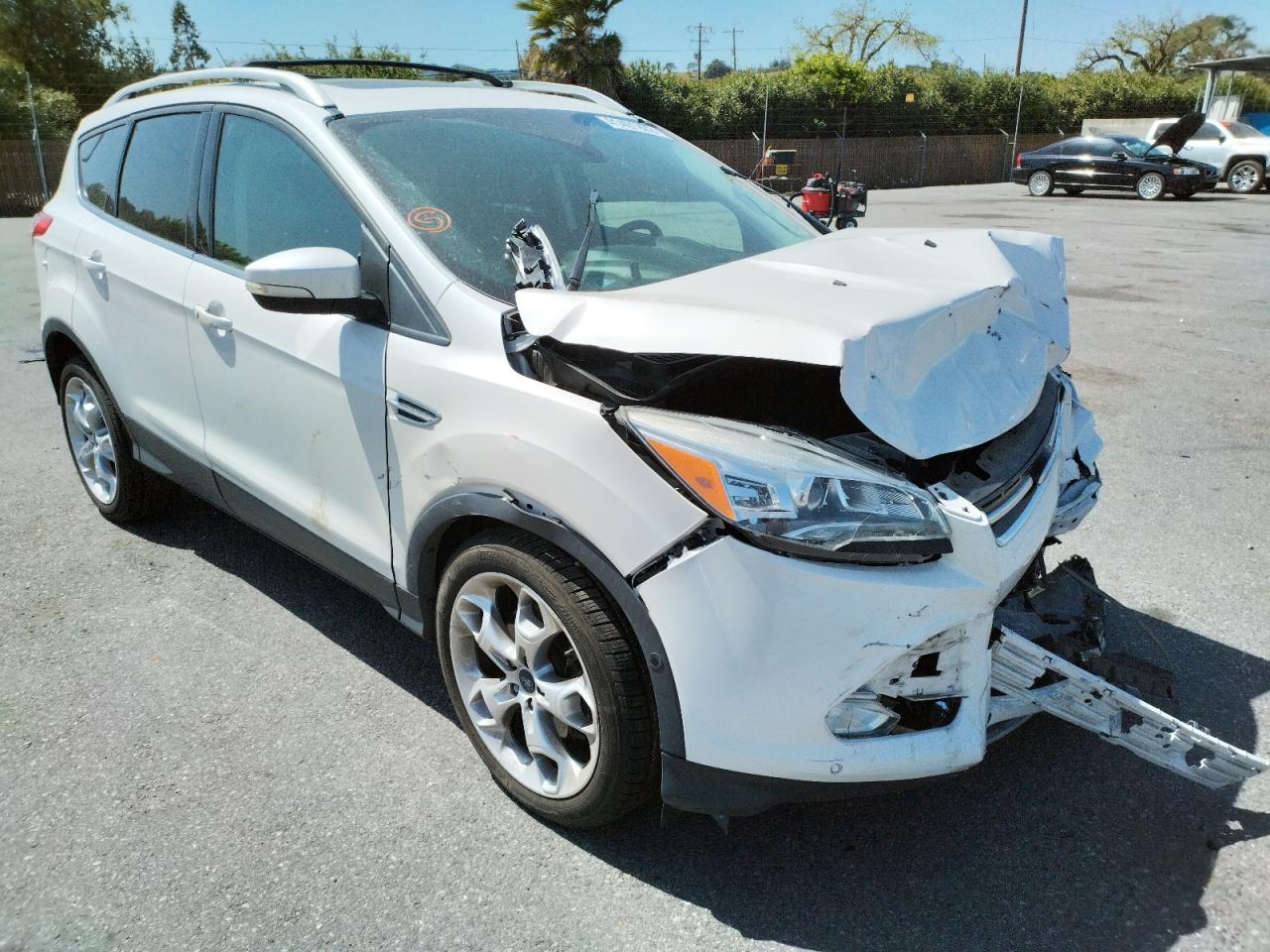 FORD ESCAPE TIT 2015 with VIN 1FMCU0J9XFUC05496 - Photo from auction