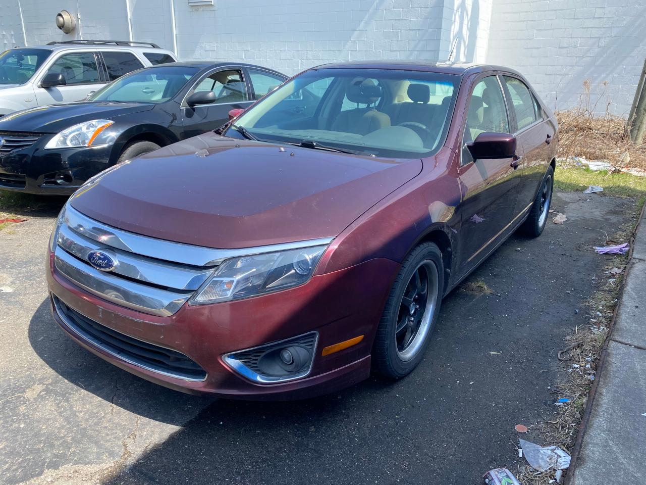 Photo 2 from auction – 2011 FORD FUSION SE with VIN 3FAHP0HA4BR148172