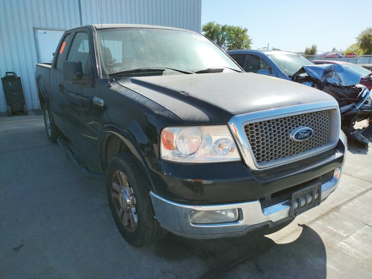 FORD F-150 2004 with VIN 1FTRX12554KD56309 - Photo from auction