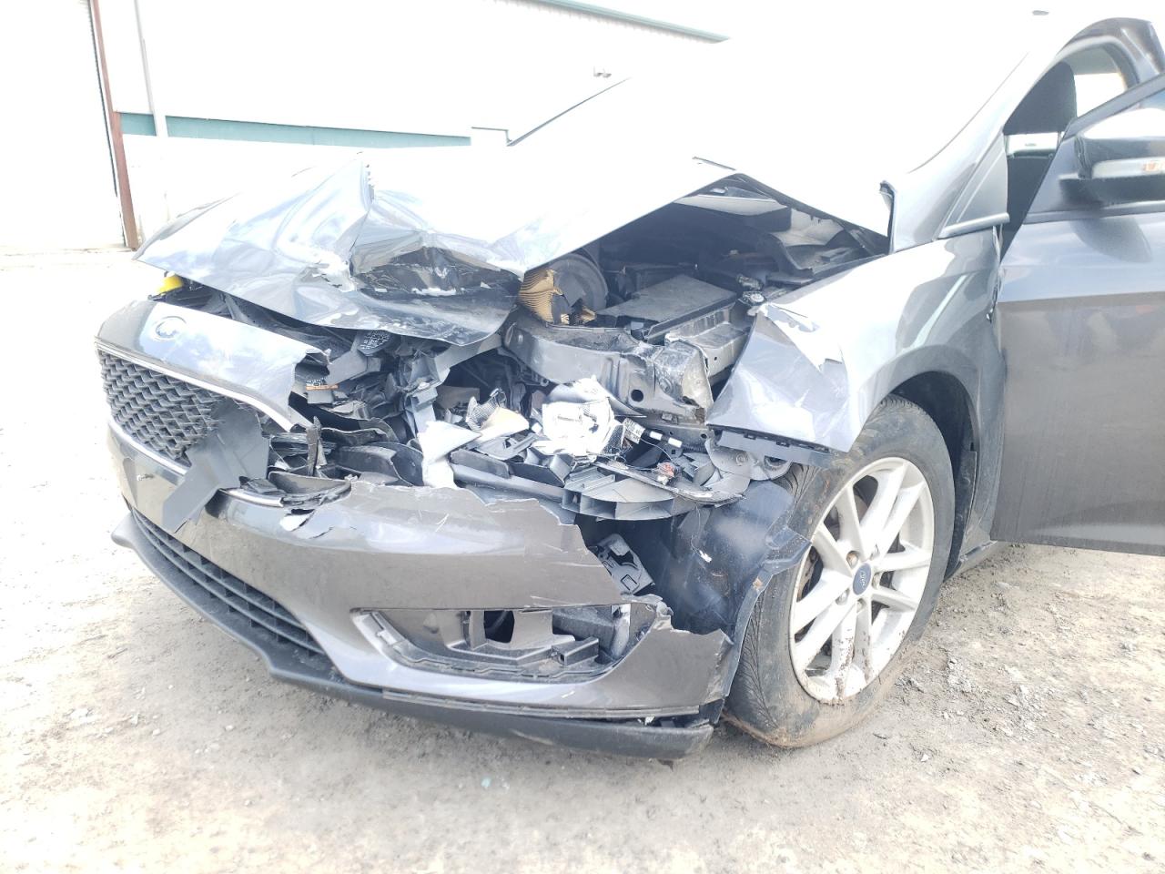 Photo 9 from auction – 2016 FORD FOCUS SE with VIN 1FADP3F2XGL354484