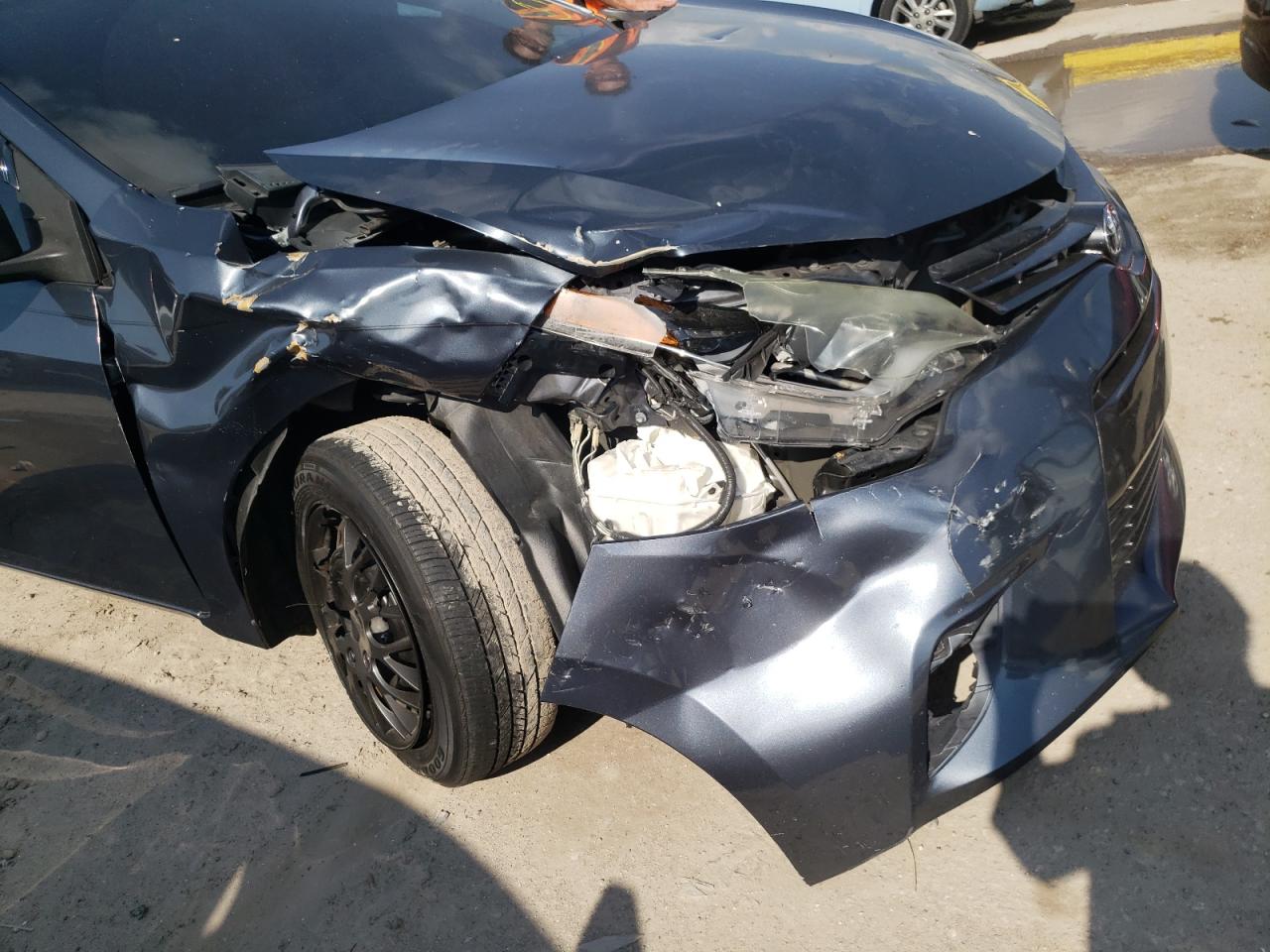 Photo 9 from auction – 2016 TOYOTA COROLLA L with VIN 5YFBURHE2GP536482