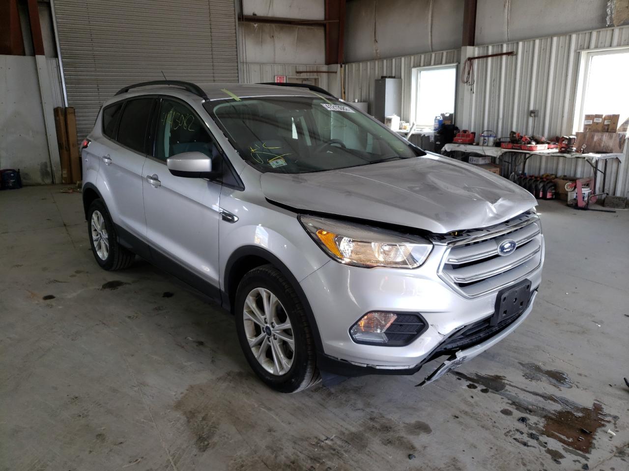 FORD ESCAPE SE 2018 with VIN 1FMCU9GD2JUB00962 - Photo from auction