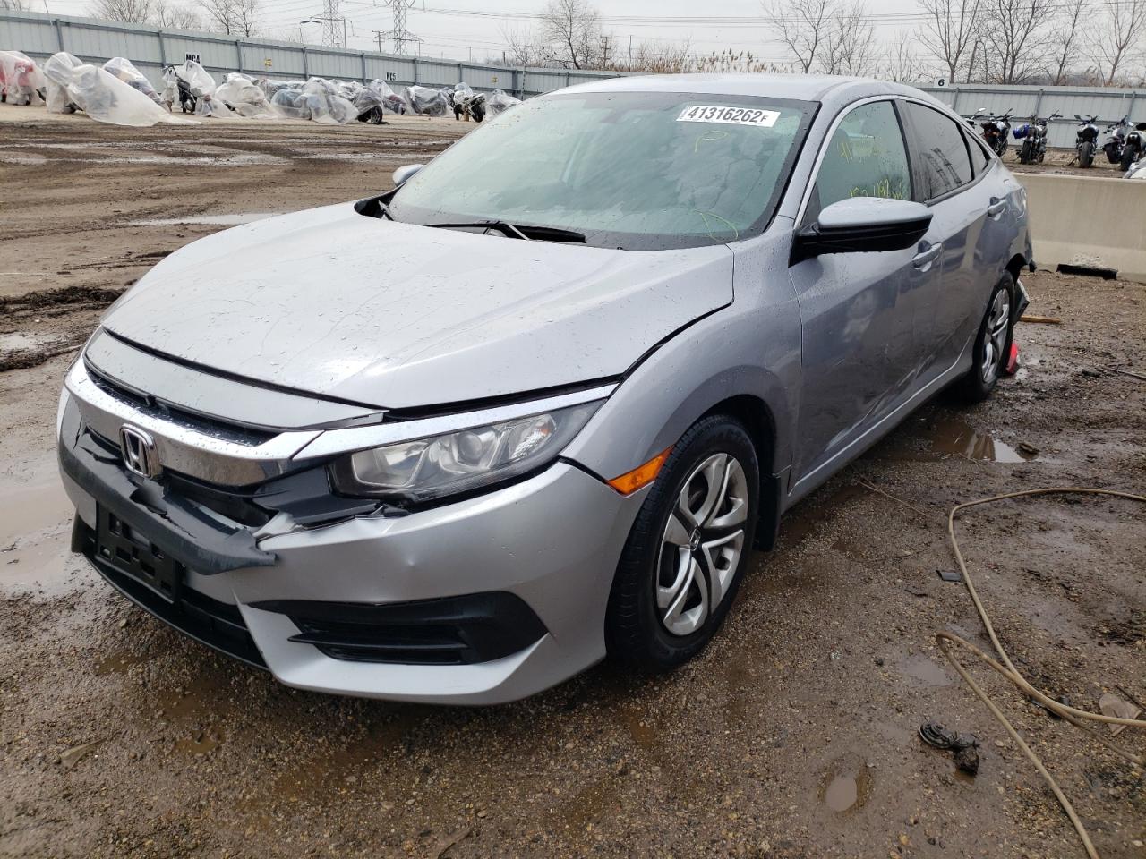 Photo 2 from auction – 2016 HONDA CIVIC LX with VIN 19XFC2F52GE030876