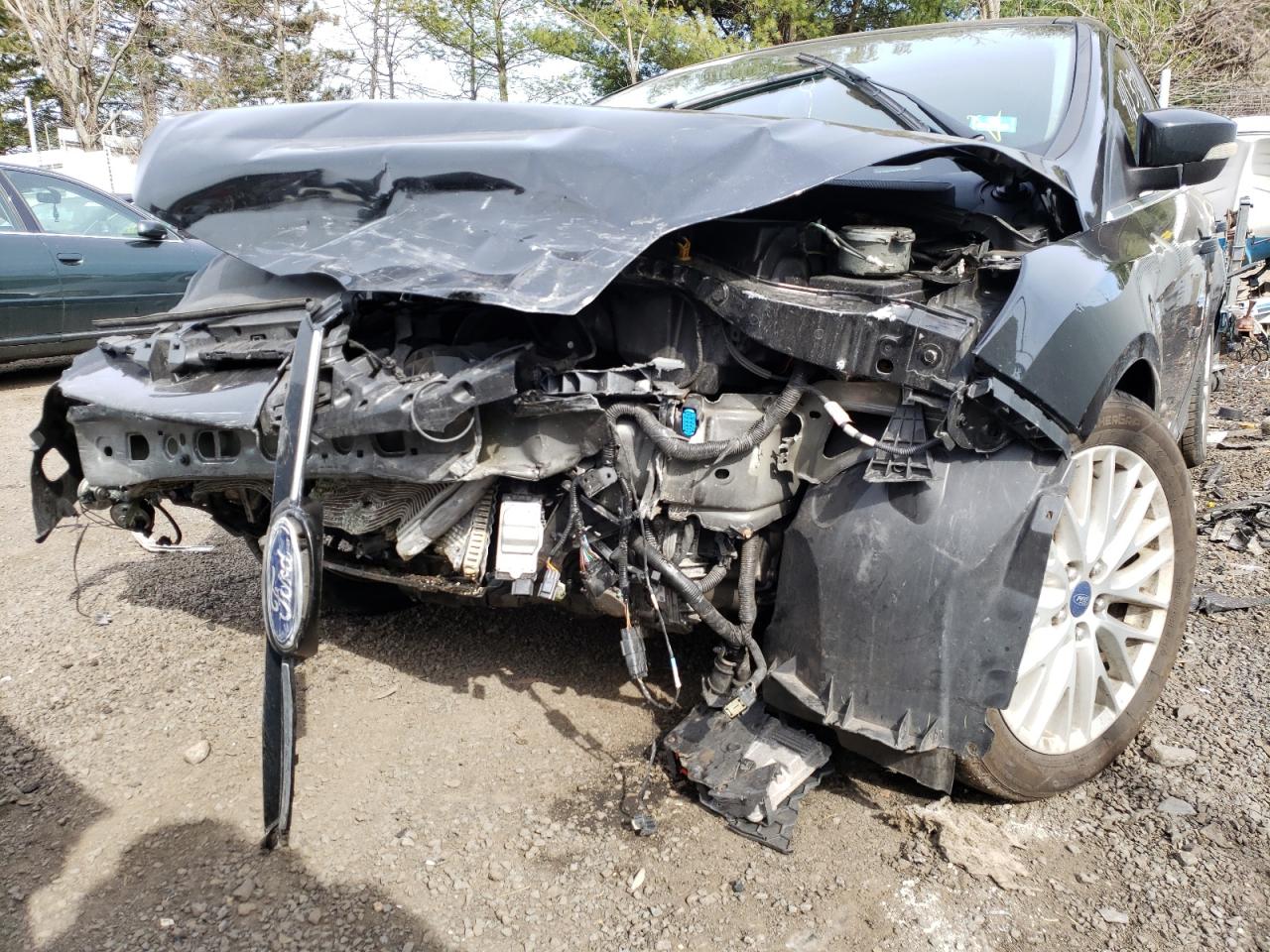 Photo 9 from auction – 2014 FORD FOCUS TITA with VIN 1FADP3N23EL409128