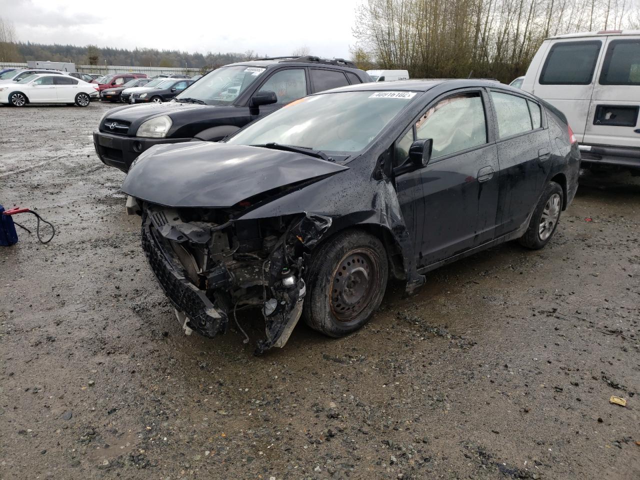 Photo 2 from auction – 2010 HONDA INSIGHT LX with VIN JHMZE2H56AS037448