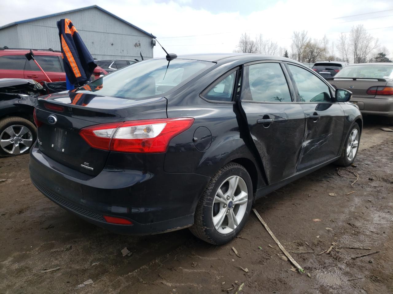 Photo 4 from auction – 2014 FORD FOCUS SE with VIN 1FADP3F24EL266172